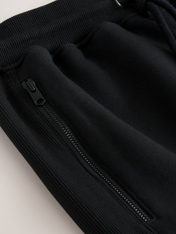 Next Zúžený strih Kapsáče - Čierna