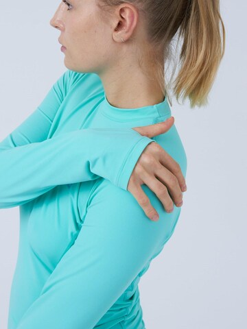 SPORTKIND - Camiseta funcional 'High-Neck' en verde