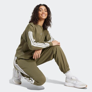 ADIDAS SPORTSWEAR Tapered Sporthose in Grün