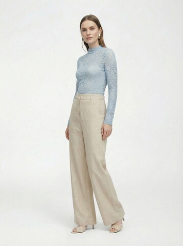 KAVAZI Loose fit Trousers in Beige