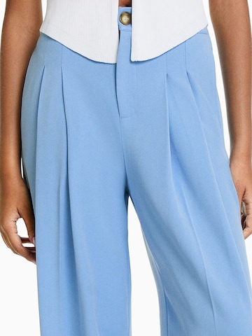 Bershka Loose fit Pleated Pants in Blue