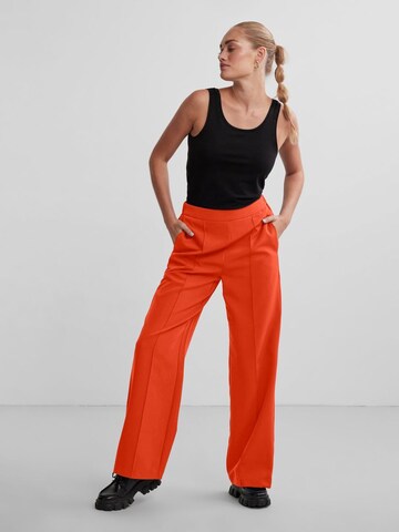 PIECES Wide leg Pants 'PCBOZZY' in Orange