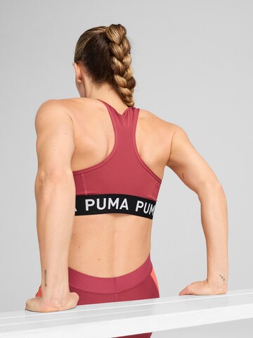 Bustino Reggiseno sportivo '4KEEPS' di PUMA in lilla