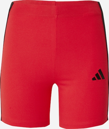 Skinny Pantaloni sportivi 'Essentials' di ADIDAS SPORTSWEAR in rosso: frontale