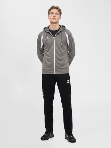Veste de survêtement 'Core 2.0' Hummel en blanc