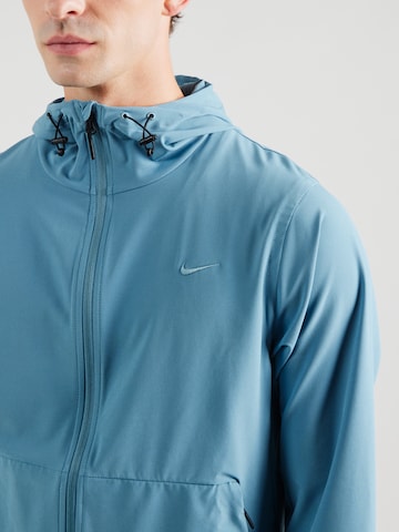 NIKE Спортивная куртка 'UNLIMITED' в Синий