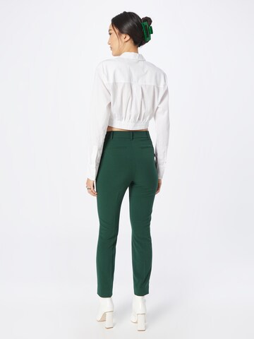 Coupe slim Pantalon à plis Warehouse en vert