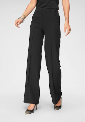 BRUNO BANANI Pleat-Front Pants in Black: front