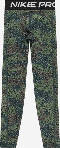 NIKE Skinny Sportbroek in Groen