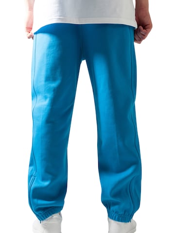 Tapered Pantaloni di Urban Classics in blu