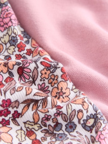 Set Next en rose
