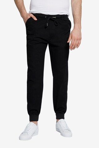 Effilé Pantalon chino STHUGE en noir : devant