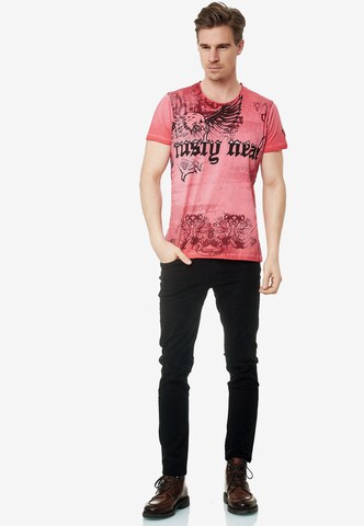 Rusty Neal Cooles T-Shirt mit Allover-Print in Rot