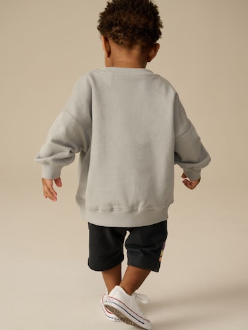 Set Next en gris