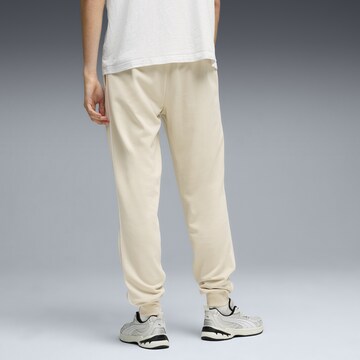 PUMA Tapered Broek 'Essentials' in Beige