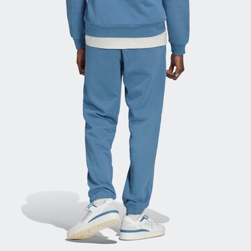 Tapered Pantaloni 'Reclaim Logo' de la ADIDAS ORIGINALS pe albastru
