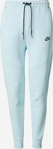 Nike Sportswear Housut 'TCH FLC' värissä sininen: etupuoli