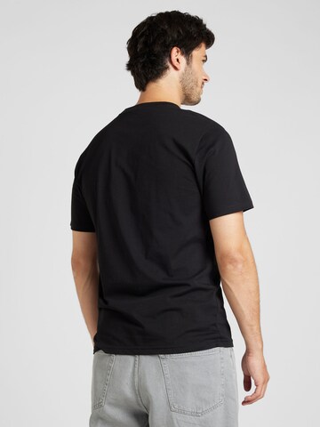 Carhartt WIP - Camiseta 'Paradise' en negro