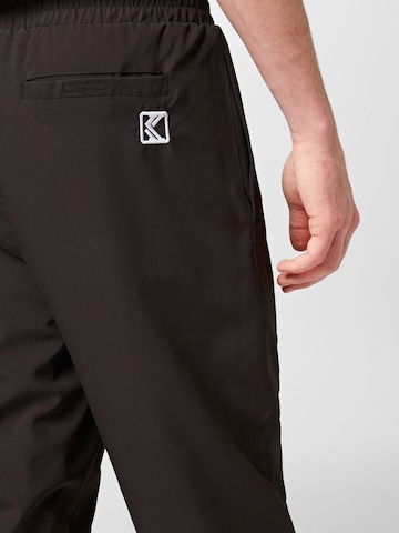 Loosefit Pantaloni de la Karl Kani pe negru