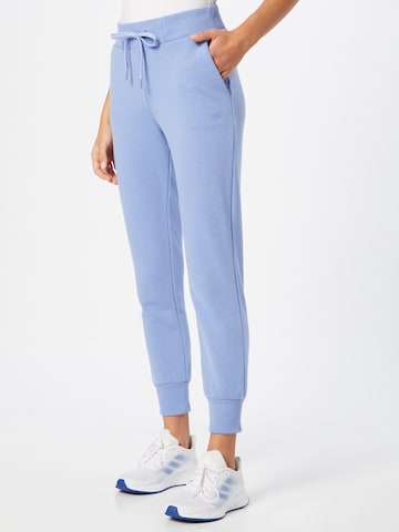 Tapered Pantaloni sportivi di 4F in blu: frontale