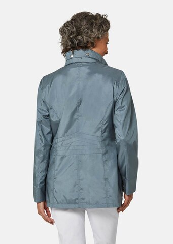 Goldner Jacke in Blau