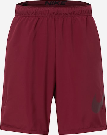 Pantaloni sportivi di NIKE in rosso: frontale