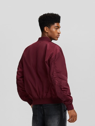 Veste mi-saison Bershka en rouge