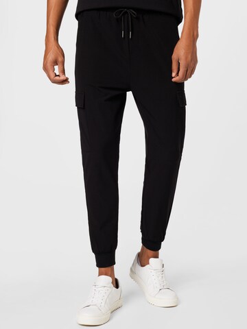 Effilé Pantalon cargo 'Oliver' JUST JUNKIES en noir : devant