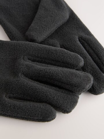 Gants Next en noir