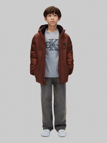 ruda Calvin Klein Jeans Žieminė striukė 'Essential'