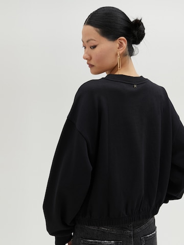 Lola Casademunt - Sudadera en negro