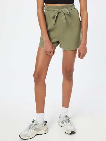 Trendyol Loose fit Pants in Green: front