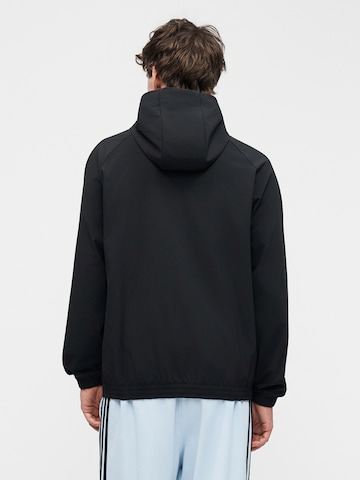ADIDAS ORIGINALS Jacke 'Trefoil Essentials' in Schwarz