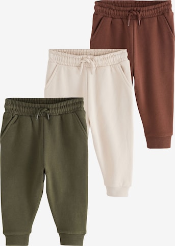 Next Tapered Housut värissä beige: etupuoli