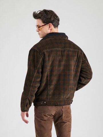 LEVI'S ® Přechodná bunda 'Relaxed Fit Sherpa Trucker Jacket' – hnědá