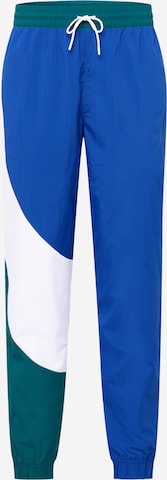 Tapered Pantaloni sportivi 'Clyde' di PUMA in blu: frontale