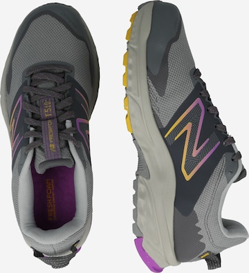 new balance - Sapatilha de corrida em cinzento