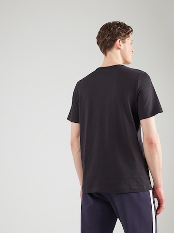 PUMA Majica 'ESS' | črna barva