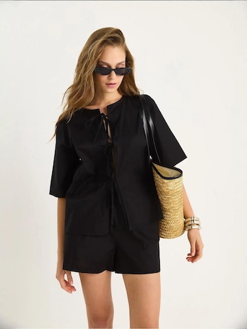 Bianco Lucci - Calças de fato em preto: frente