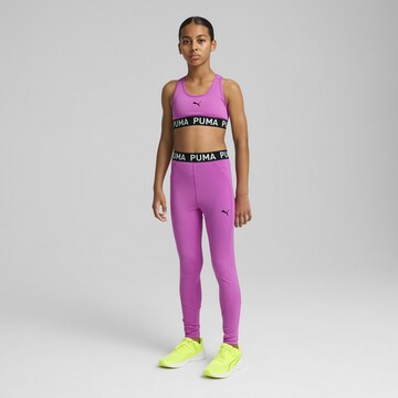 PUMA Skinny Sports trousers 'Strong' in Purple