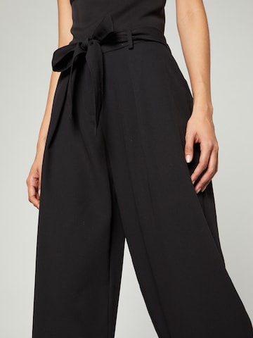 Loosefit Pantaloni con pieghe 'Isa' di LENI KLUM x ABOUT YOU in nero