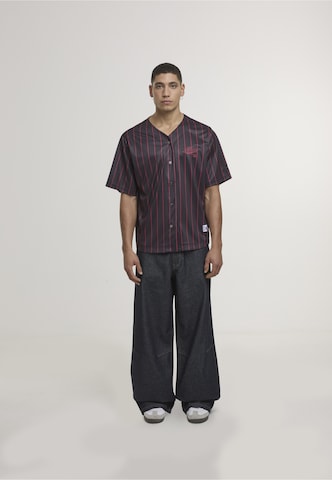 Fit confort Chemise 'Varsity' Karl Kani en noir