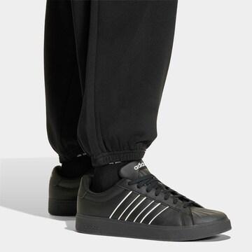 ADIDAS SPORTSWEAR Baggy Workout Pants in Black