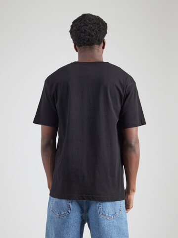 VANS - Camiseta 'ROAD STOP' en negro