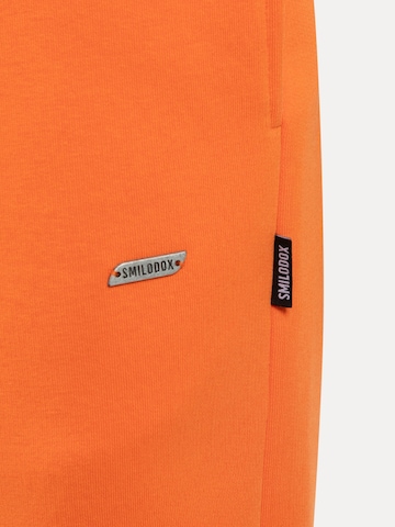 Effilé Pantalon Smilodox en orange