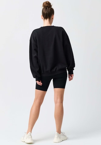 OCEANSAPART Sweatshirt 'Maya' in Black