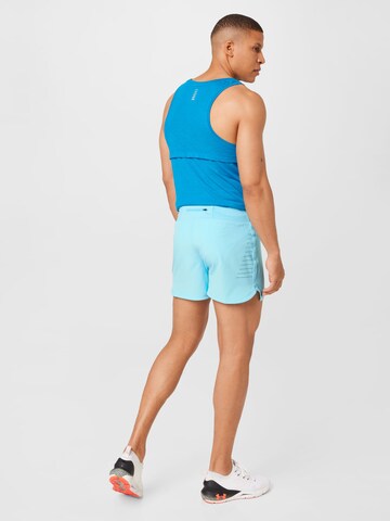 UNDER ARMOUR Regular Sporthose 'Speedpocket' in Blau