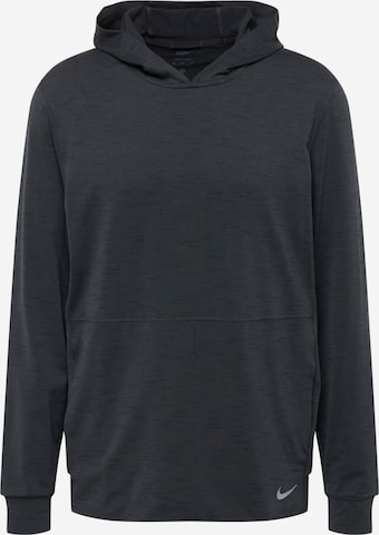 NIKE - Camiseta deportiva en negro: frente