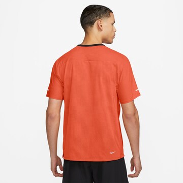 NIKE Performance Shirt 'SOLAR CHASE' in Orange