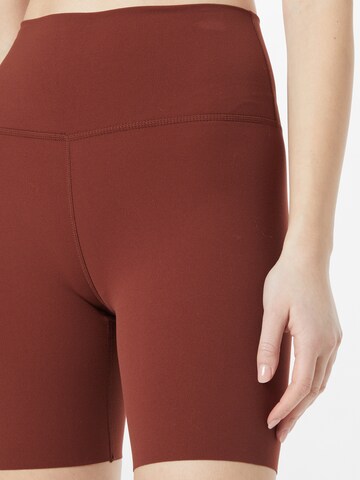 NIKE Workout Pants 'Yoga Luxe 7' in Brown